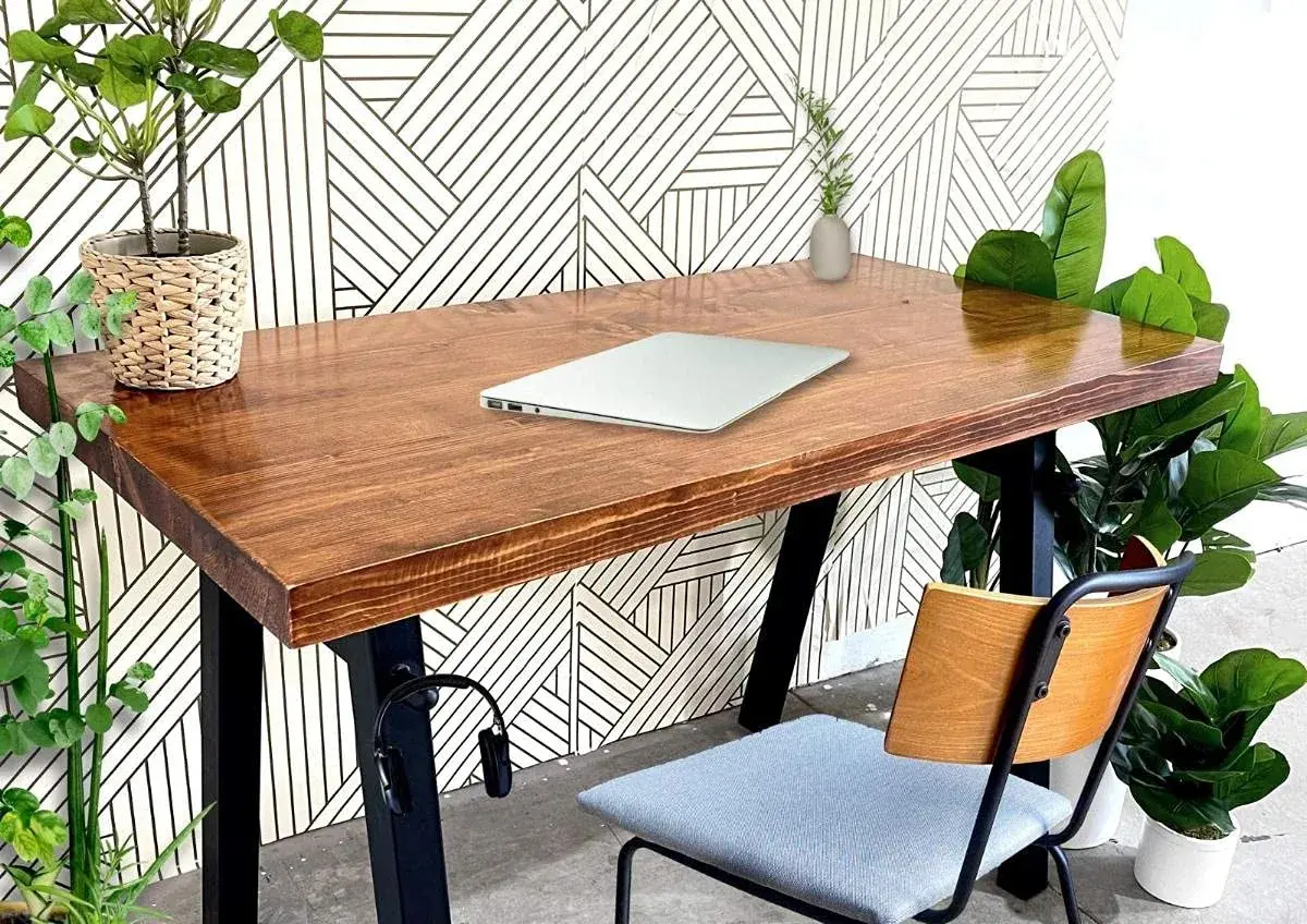 We absolutely love our reclaimed wood standing desk! It's the perfect blend of rustic and modern, and it's so sturdy and well-made